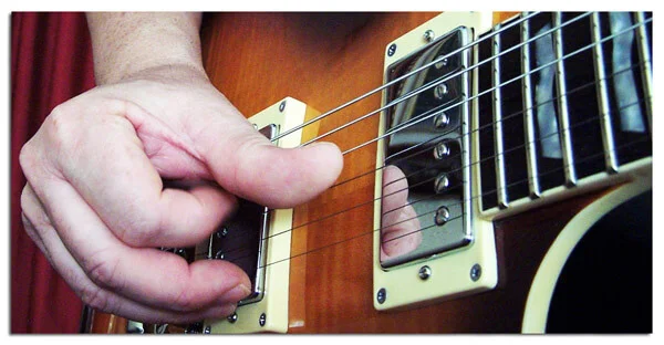 Artificial Harmonics on Guitar